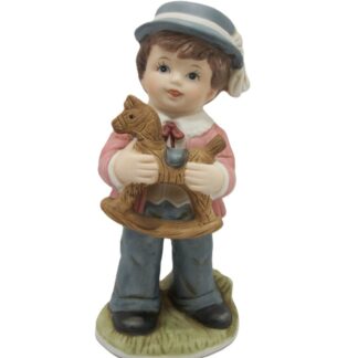 Homco #1419 figurine of boy holing rocking horse.