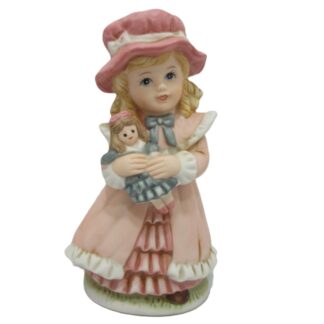 Homco figurine 1419 girl holding a doll.