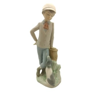 nao daisa 1983 figurine of boy with dog